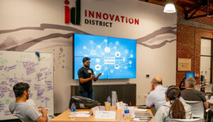 Throughout the program, attendees work on their presentation skills. In one session, Sainagesh Veeravalli, a UGA computer science student, practiced his skills with a presentation on blockchain technology. (Photo by Jason Thrasher)
