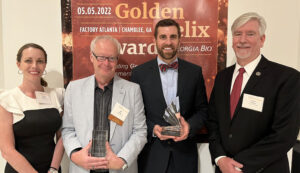 Left to right, Christy Anderson, Ian Biggs, Kyle Tschepikow and Derek Eberhart accepted awards for UGA at Georgia Bio’s 2022 Golden Helix awards dinner, held May 5 in Atlanta. (Contributed photo)
