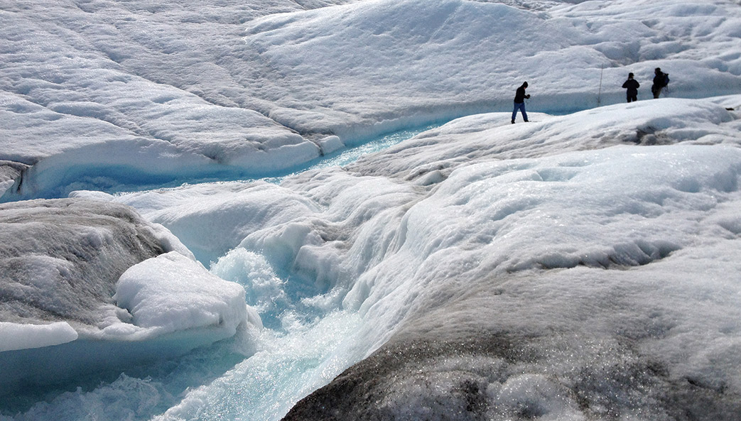 Researchers led by Asa Rennermalm of Rutgers University and including the University of Georgia's Thomas Mote measure meltwater runoff from the ice sheet margin in Greenland during summer 2013.