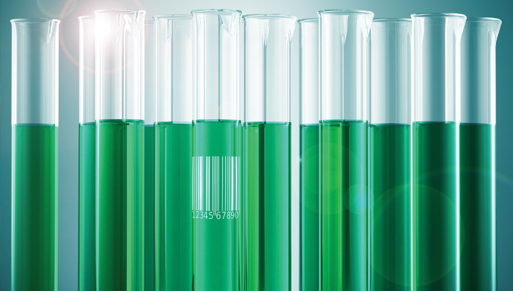 test tubes fille with green liquid