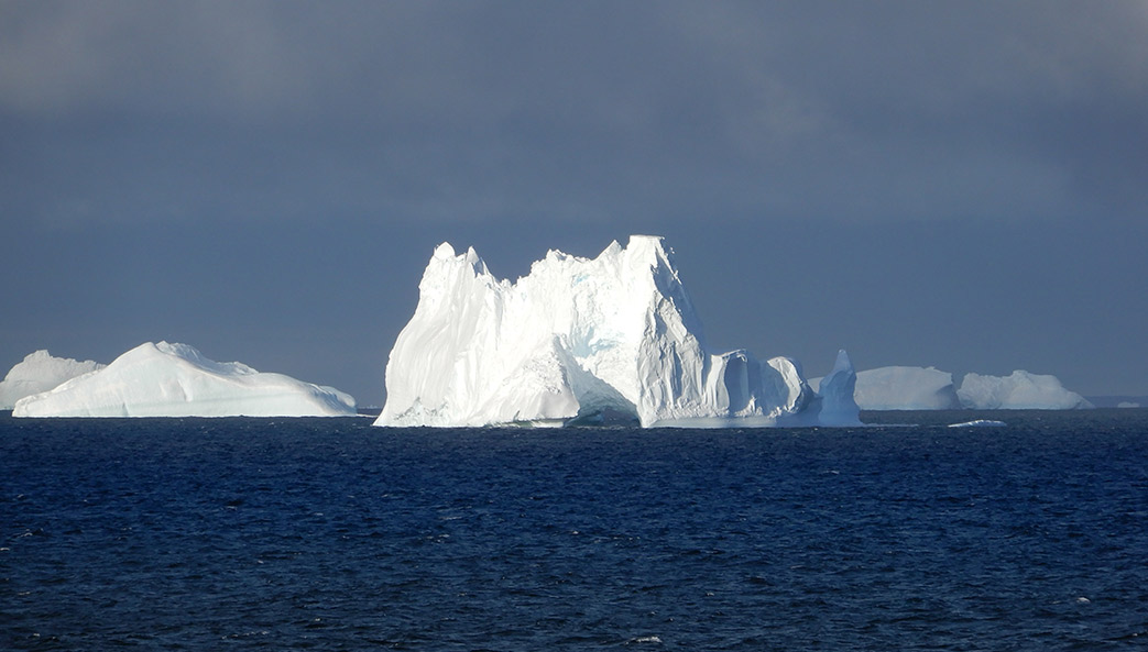 iceberg floating in ocean