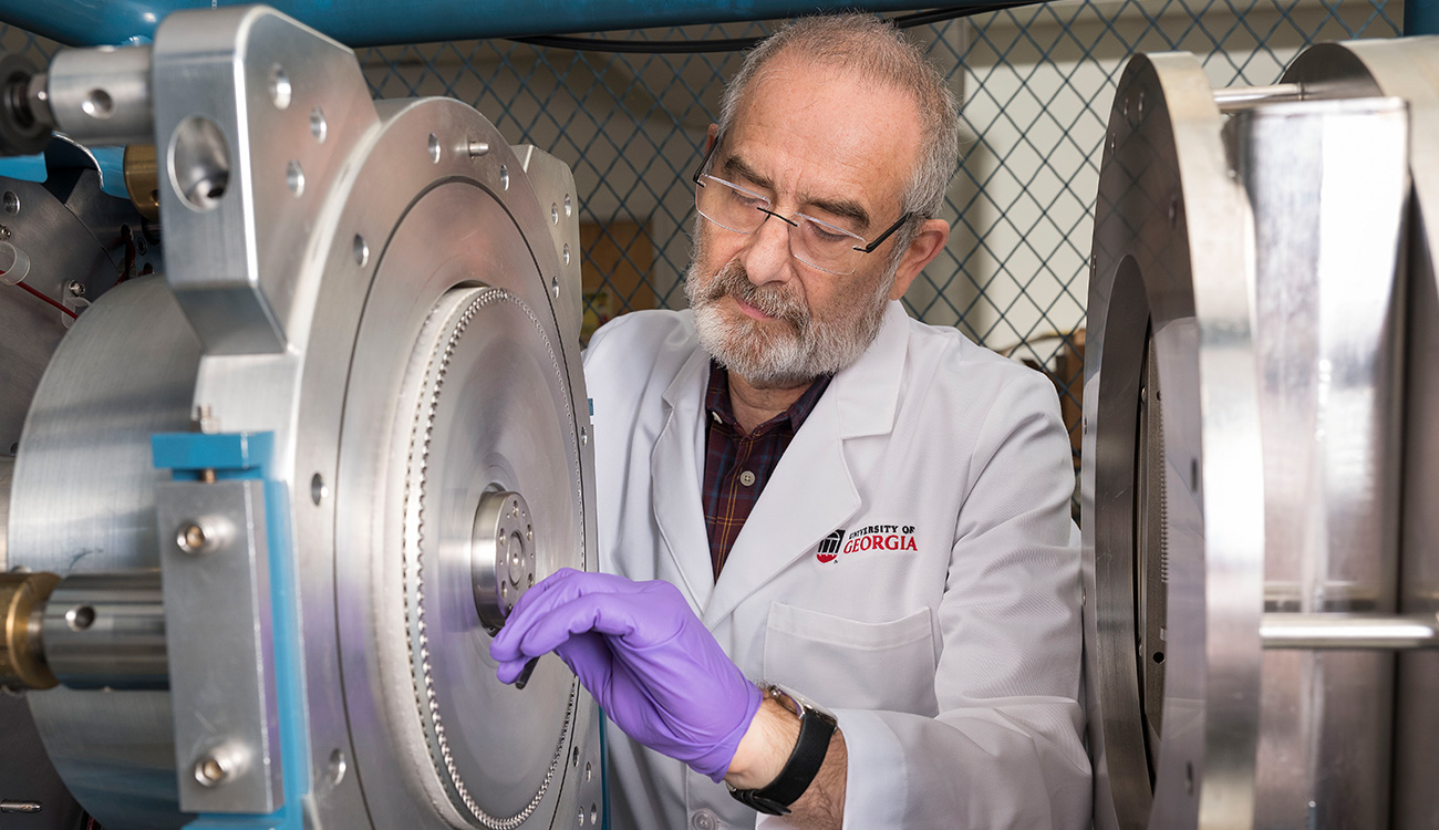Alex Cherkinsky, senior research scientist, loads samples into a mass spectrometer for radiocarbon dating. CAIS is the oldest ISO/IEC 17025-accredited radiocarbon lab in the world.
