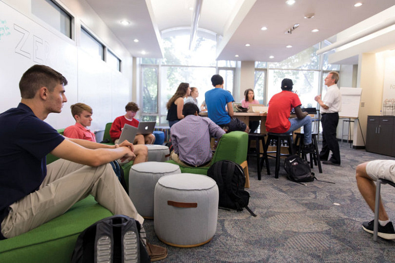 Launch Pad students live on the fourth floor of Creswell Hall, but they do a lot of their work in a renovated space on Creswell’s first floor. It includes ample collaboration space, snacks, a fridge, and a 3D printer. (Photo by Andrew Davis Tucker/UGA)