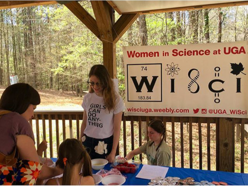 WiSci hosted a table at Sandy Creek Nature Center during its inaugural Science Open House where the children engaged in hands-on learning activities like extracting DNA from strawberries.
