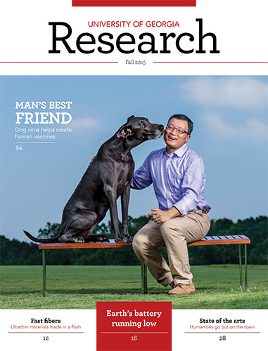 UGA Research Magazine Cover Fall 2015 Biao He and Man's Best Friend