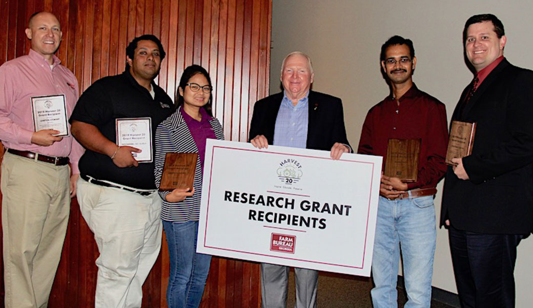 Georgia Farm Bureau President Gerald Long (center) announced the recipients of the GFB Harvest 20 Research Grants at the GFB Commodity Conference on Aug. 8. University of Georgia faculty who were awarded grants are (l-r) Lawton Stewart, Govindaraj Dev Kumar, Angelita Acebes, Sudeep Bag, Jonathan Oliver and (not pictured) Bhabesh Dutta and Mark Freeman.