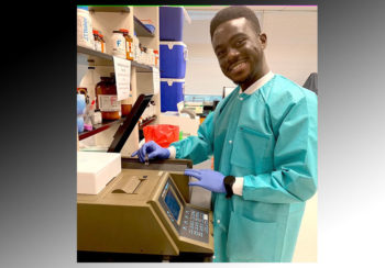 image of graduate student Ike Oguadinma in lab