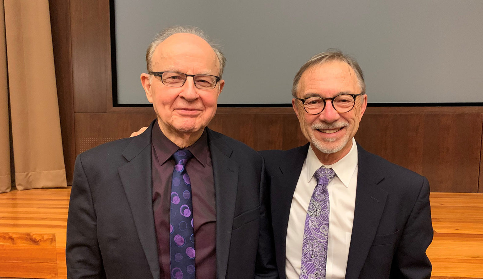 Image of professor Robert Roeder and VP of Research David Lee