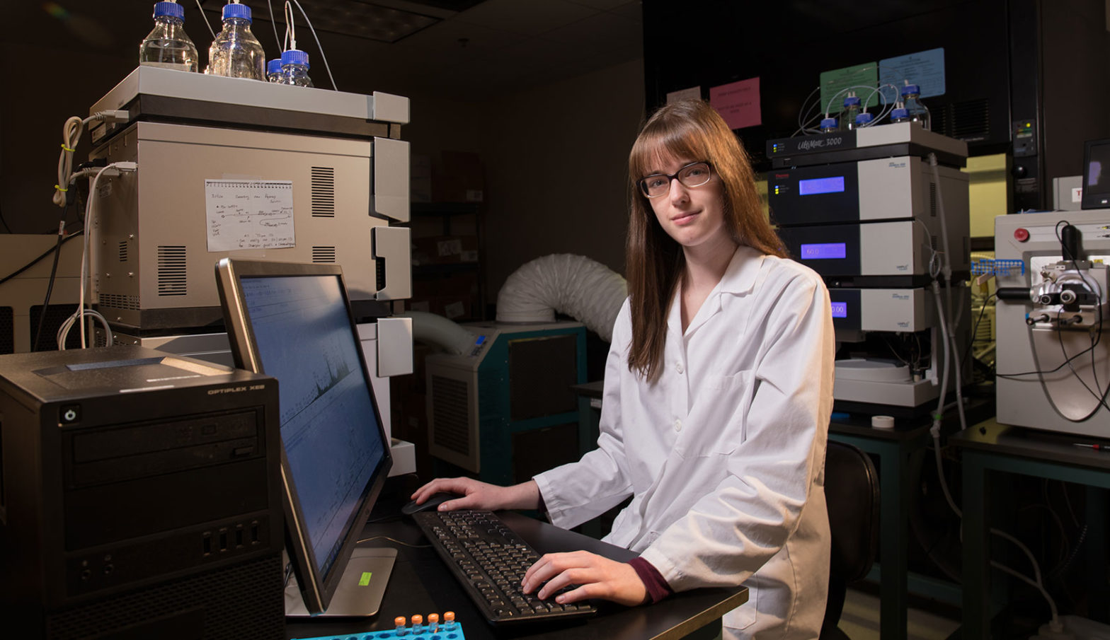 image of student Hannah Stephen sitting at computer in lab
