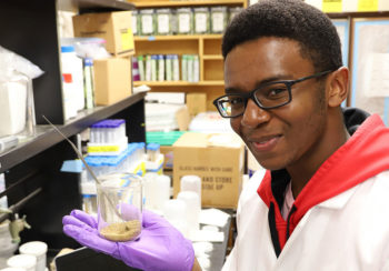 photo of UGA student Joshua Thedford in lab