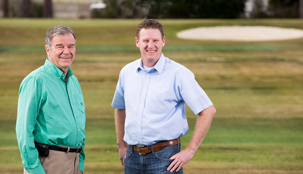 UGA professors Wayne Hanna and Brian Schwartz on golf course