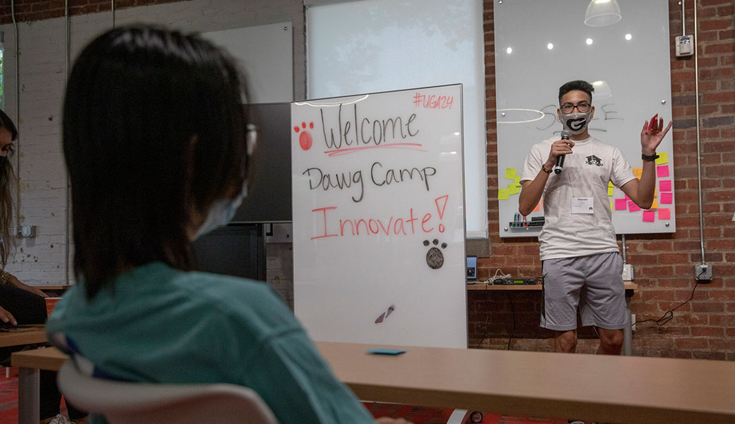 Incoming student Hussain Hassan pitches a startup business idea during Dawg Camp Innovate at Studio 225