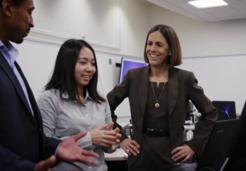 University of Georgia researcher Julie Luft working with two students