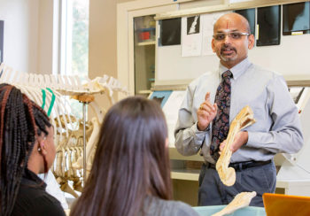 photo of UGA's Puliyur MohanKumar teaching a lab