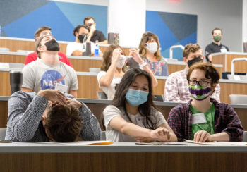 photo of Small Satellite Lab students and other attendees at a launch party