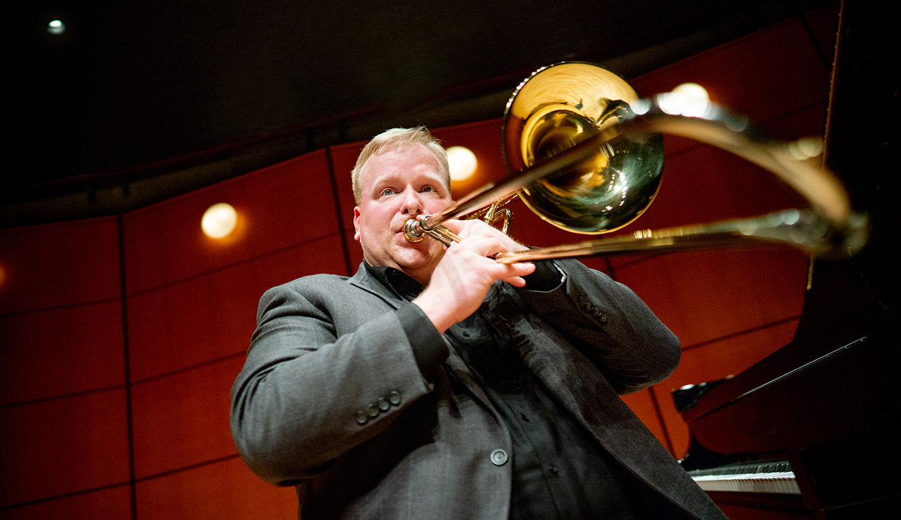 University of Georgia professor Josh Bynum playing trombone