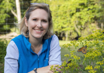 Sonia Altizer working with butterflies at the Butterfly Research Gardens at Wormsloe Institute.