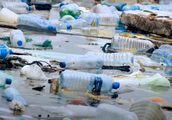 plastic pollution floating in water