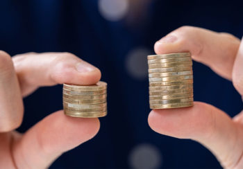 photo of two stacks of uneven coins