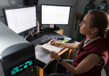 University of Georgia researcher Mandy Joye working at computer