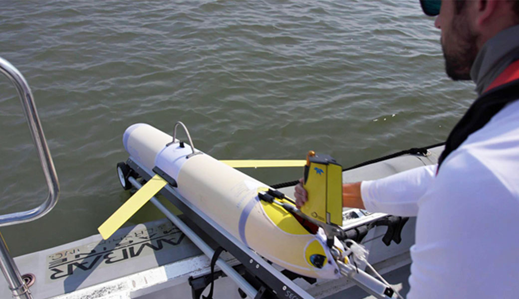 research deploying ocean glider from a boat