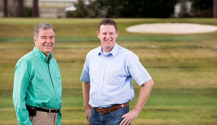 retired UGA turfgrass breeder Wayne Hanna (left) and Brian Schwartz joined UGA's turfgrass program