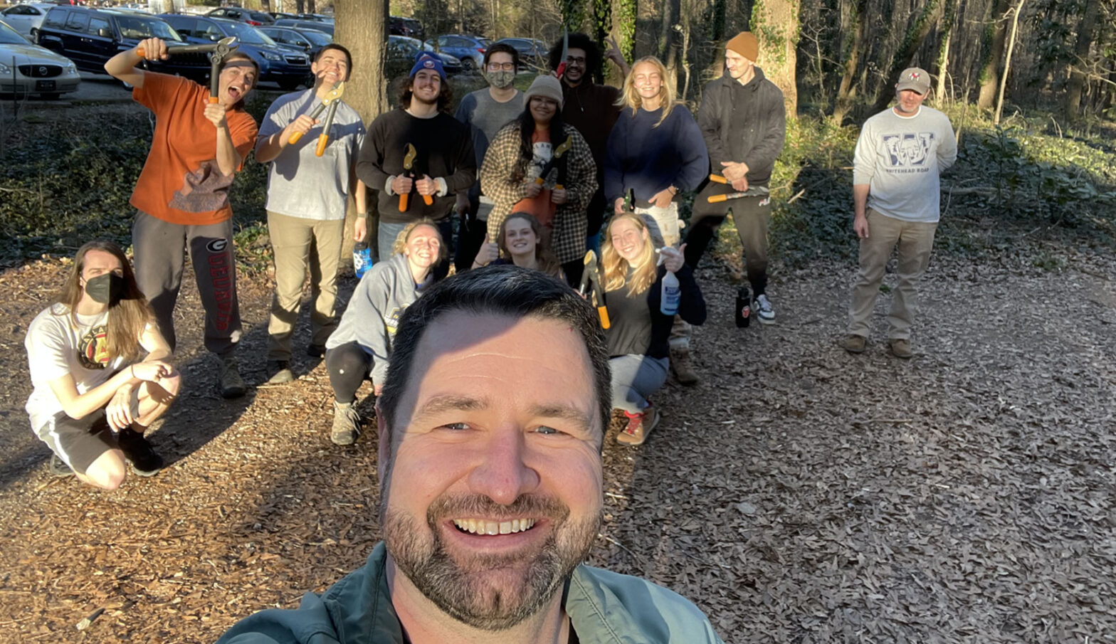 selfie of volunteer group in woods