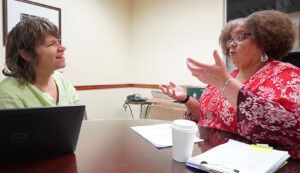 image of Tracy Anderson meeting with Anita Brown, both at the University of Georgia's Center for Family Research