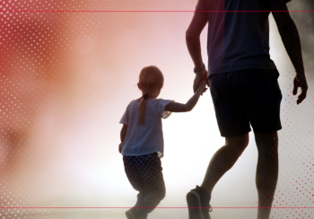 Father holding daughter's hand.