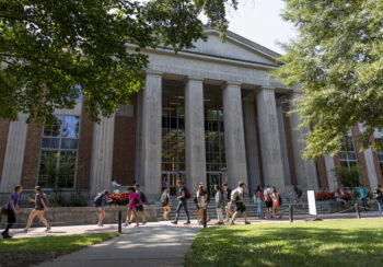 Crowds of students walking in front of the Main Library