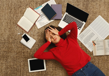 Image of a frustrated woman lying down.