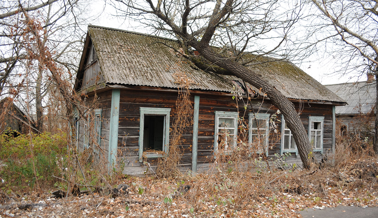 A dilapidated house sits in the Chernobyl Nuclear Exclusion Zone.