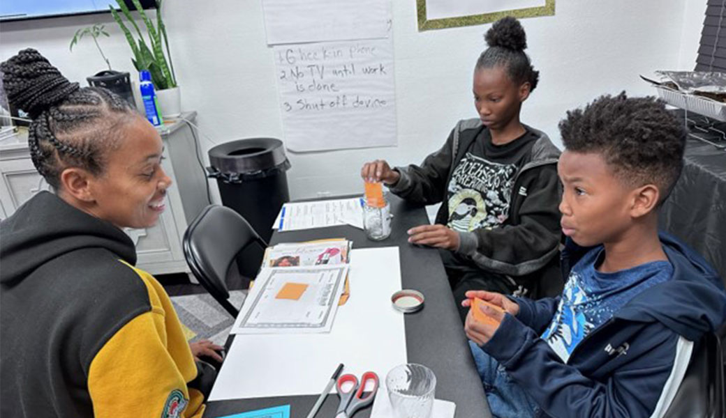 A family group with the Strong African American Families (SAAF) group meets in Compton, New Jersey. The Center for Family Research is involved with many intervention programs like SAAF.