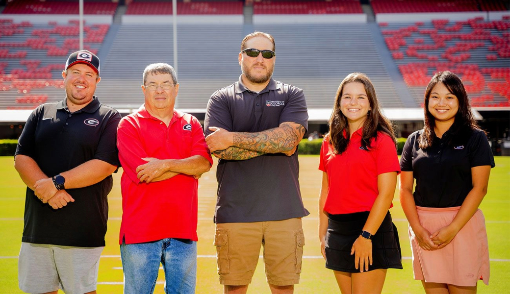 An image of Henry’s (center) team also includes (from left) Erick Begitschke, Kevin Tucker, Audrey Young and Julie Wang, among others. The large team of turfgrass researchers was one of the primary reasons Henry joined CAES in 2012.