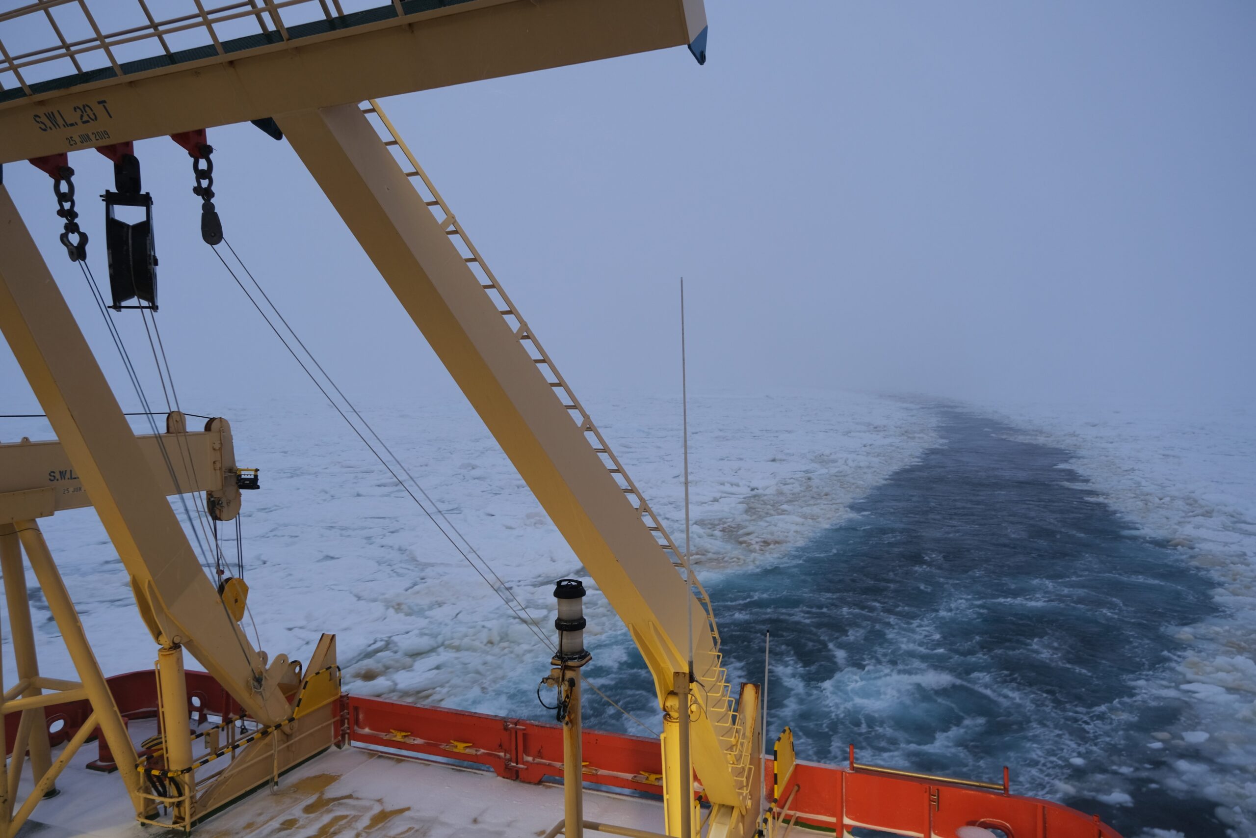 ship cuts through the ice