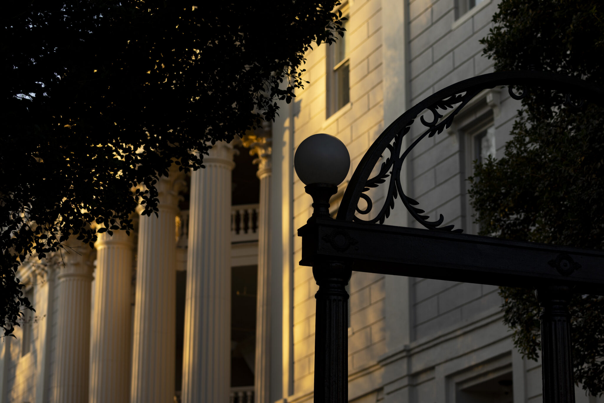 Image of UGA Arch and a building behind.