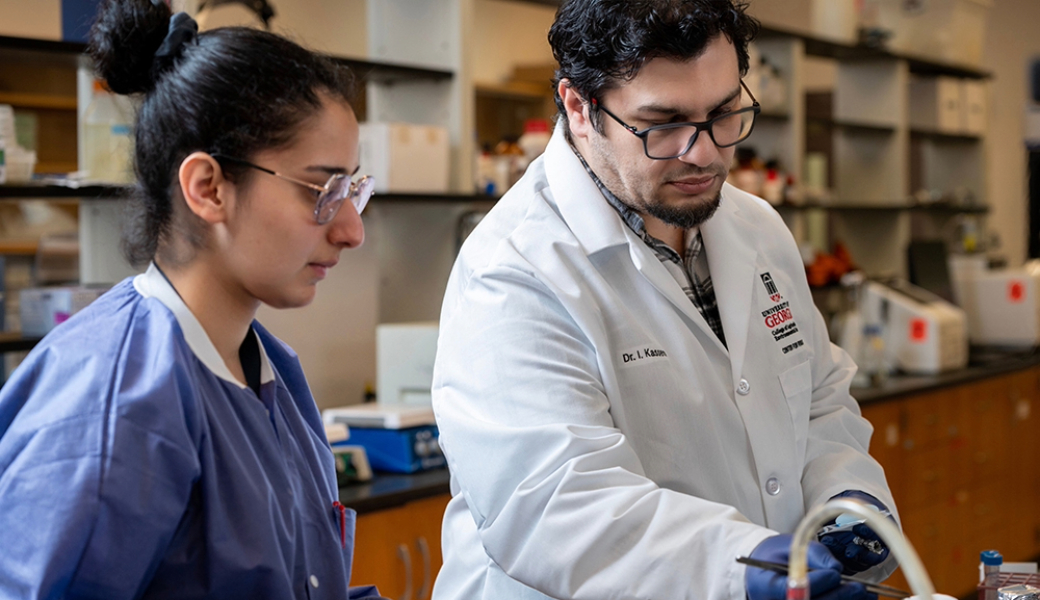 CAES Assistant Professor Issmat Kassem (right) works in his lab with Jouman Hassan, a postdoctoral researcher at the UGA Center for Food Safety. Hassan, who earned her doctorate under Kassem, is a co-author on a new study that discovered antibiotic-resistant genes in Georgia surface and waste waters.