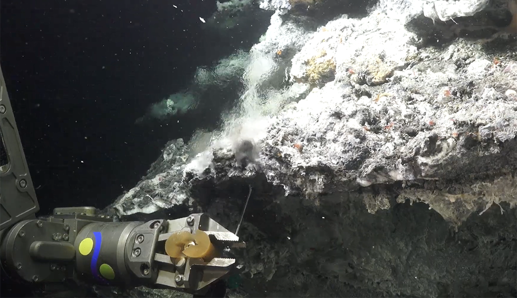 At hydrothermal vents, seawater circulates through cracks and fissures in the seafloor and interacts with hot magma beds, heating the seawater and chemically altering it.