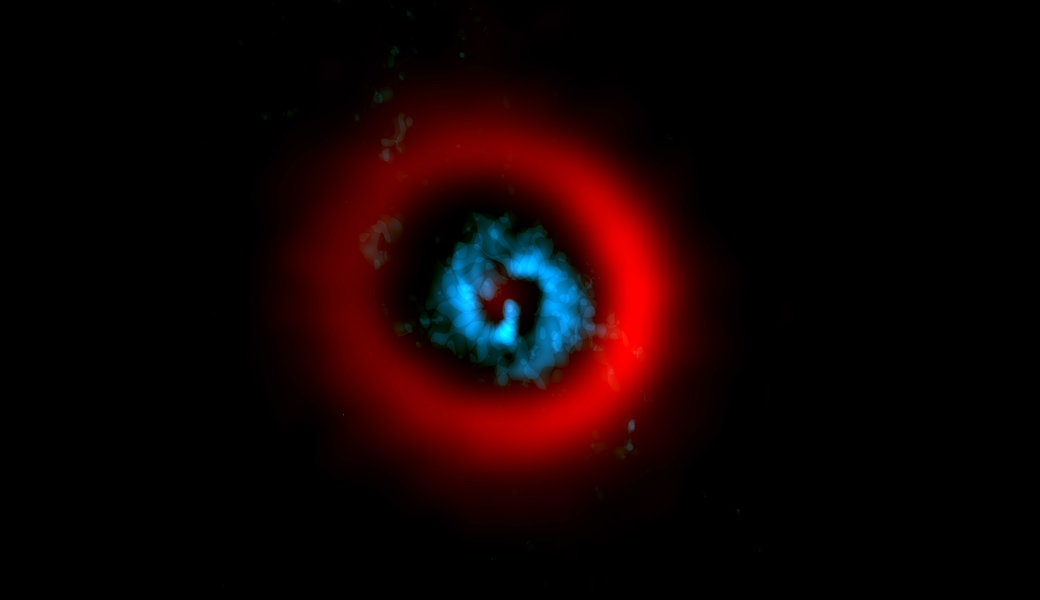 ALMA image of the dust ring (red) and gaseous spirals (blue) of the circumstellar disk AB Aurigae reveal gaseous spiral arms inside a wide dust gap, providing a hint of planet formation.