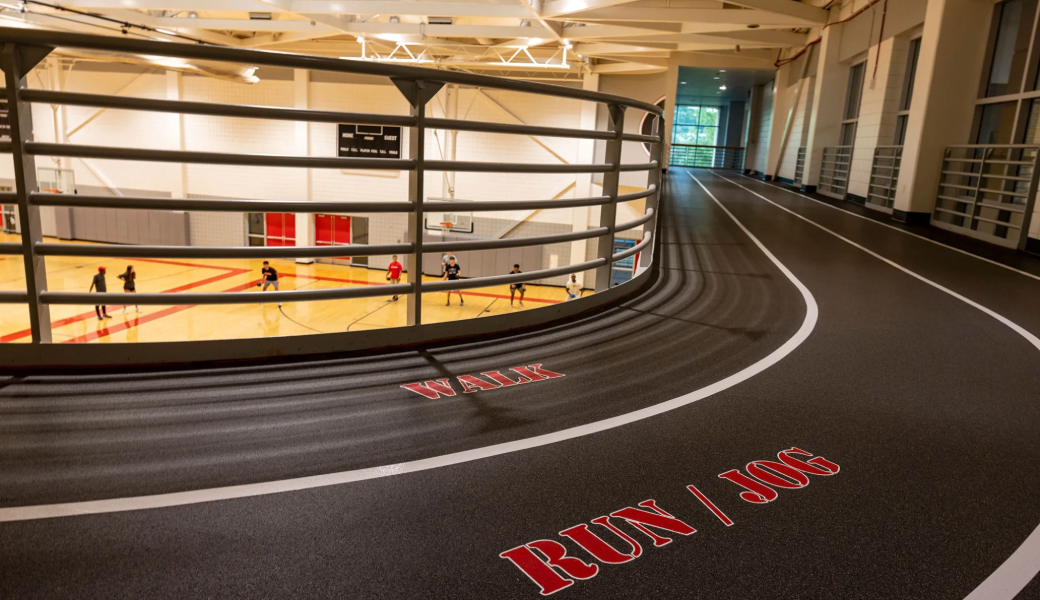 Image of indoor track overlooking a basketball court in Ramsey Center at UGA